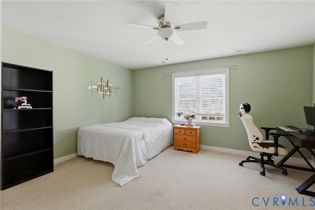 11813 Longfellow Drive, Bayhill Pointe, Midlothian, VA 23112 Room featuring neutral carpeting, a central ceiling fan with integrated lighting, and a window with horizontal blinds