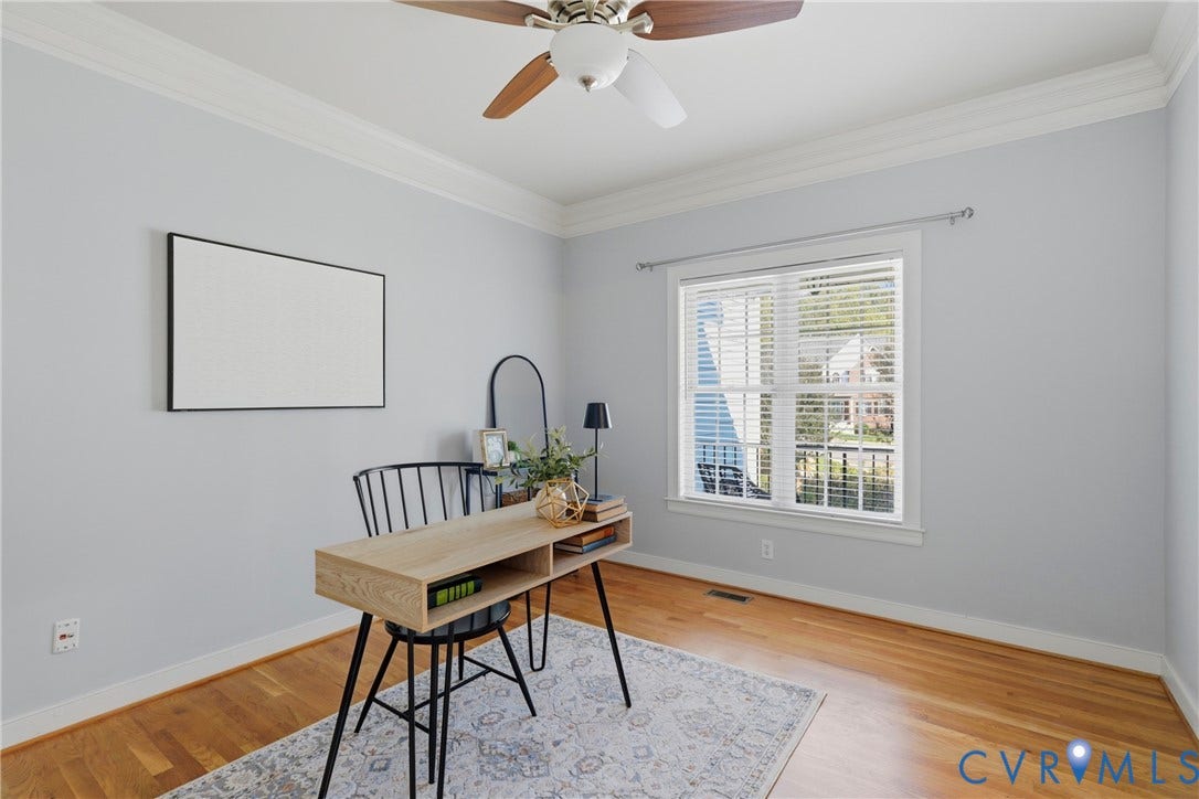 11813 Longfellow Drive, Bayhill Pointe, Midlothian, VA 23112 Wood-finish flooring, crown molding, and a multi-blade ceiling fan with a central light fixture