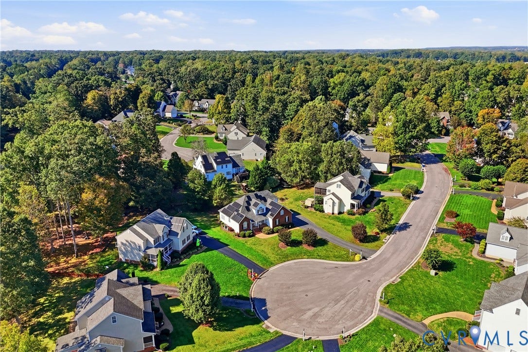 11813 Longfellow Drive, Bayhill Pointe, Midlothian, VA 23112 Aerial perspective of a residential neighborhood featuring cul-de-sac streets, expansive green spaces, mature tree canopies, and traditional detached homes
