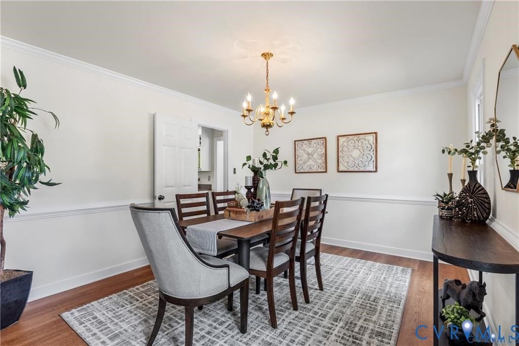 Warm wood-finish flooring with white walls