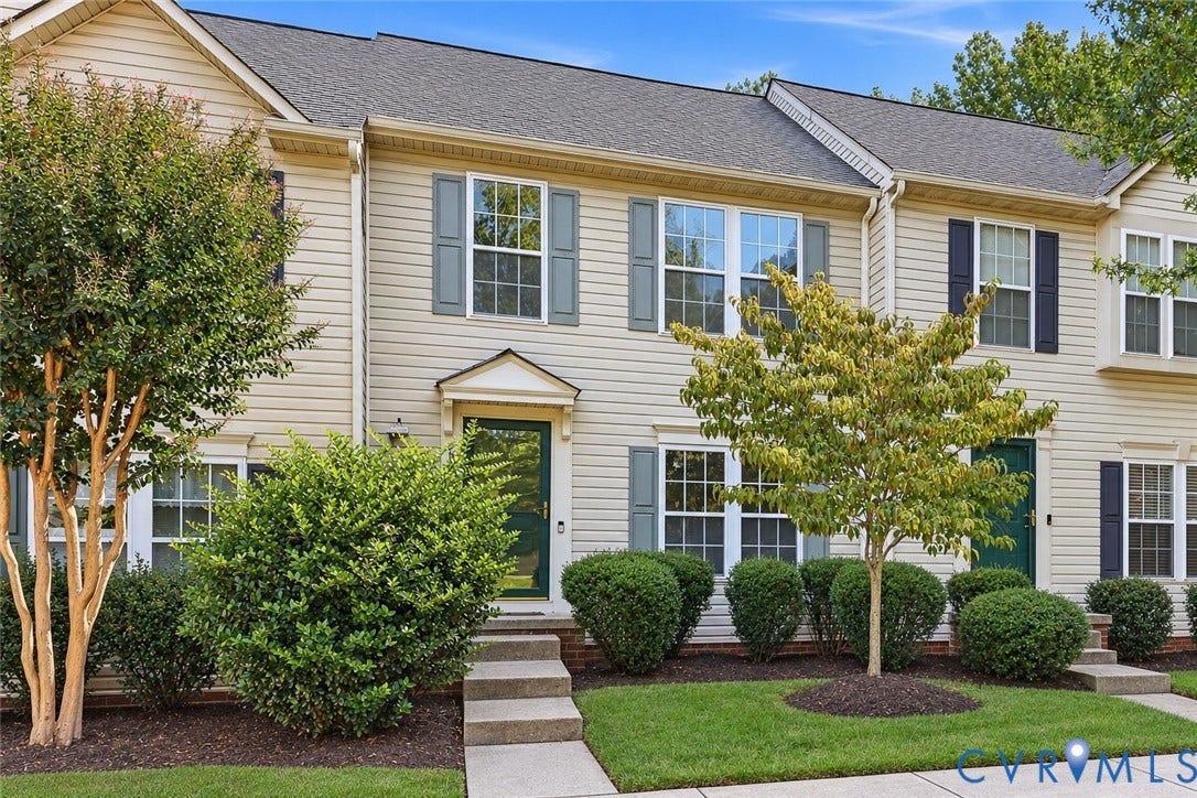2803 Queensland Drive, #2803, Pemberton Oaks, Glen Allen, VA 23294 Two-story exterior featuring light-colored horizontal siding, dark shutters, multi-pane windows, and concrete walkways