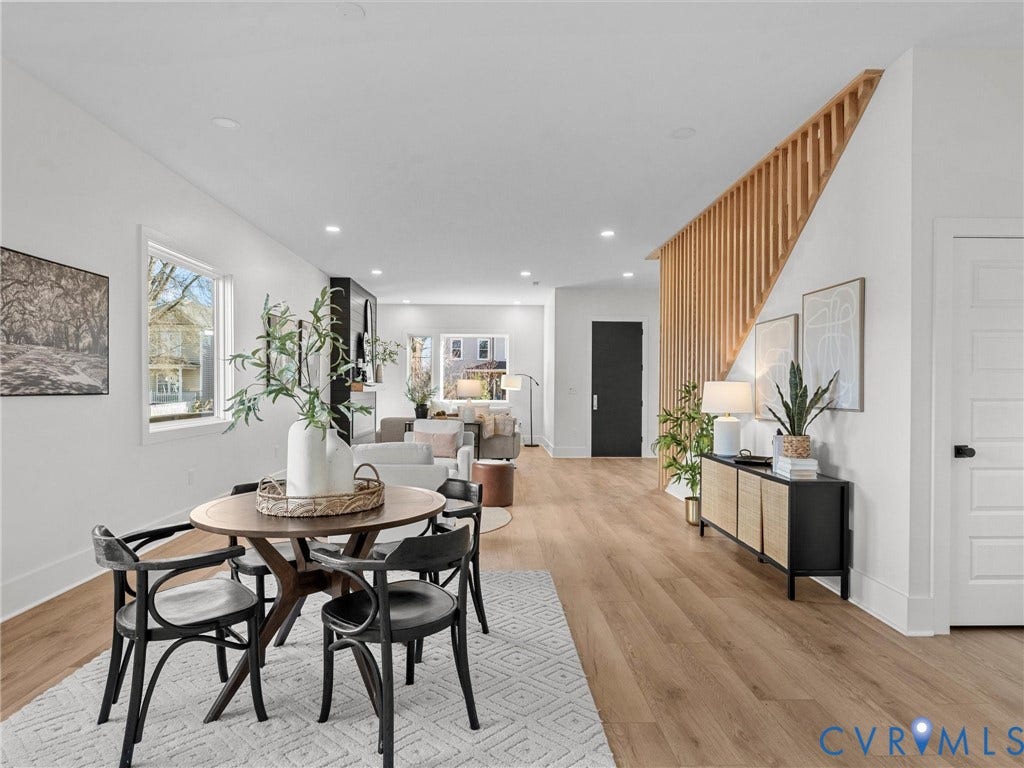 2202 3rd Avenue, Northside, Richmond, VA 23222 Open-concept living space featuring wood-finish flooring, recessed lighting, and a modern slatted wood staircase partition