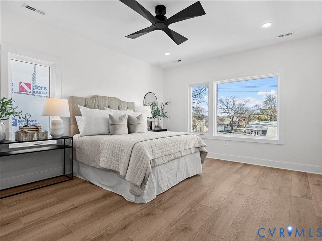 2202 3rd Avenue, Northside, Richmond, VA 23222 Wood-finish flooring, recessed lighting, ceiling fan, and large windows with white trim