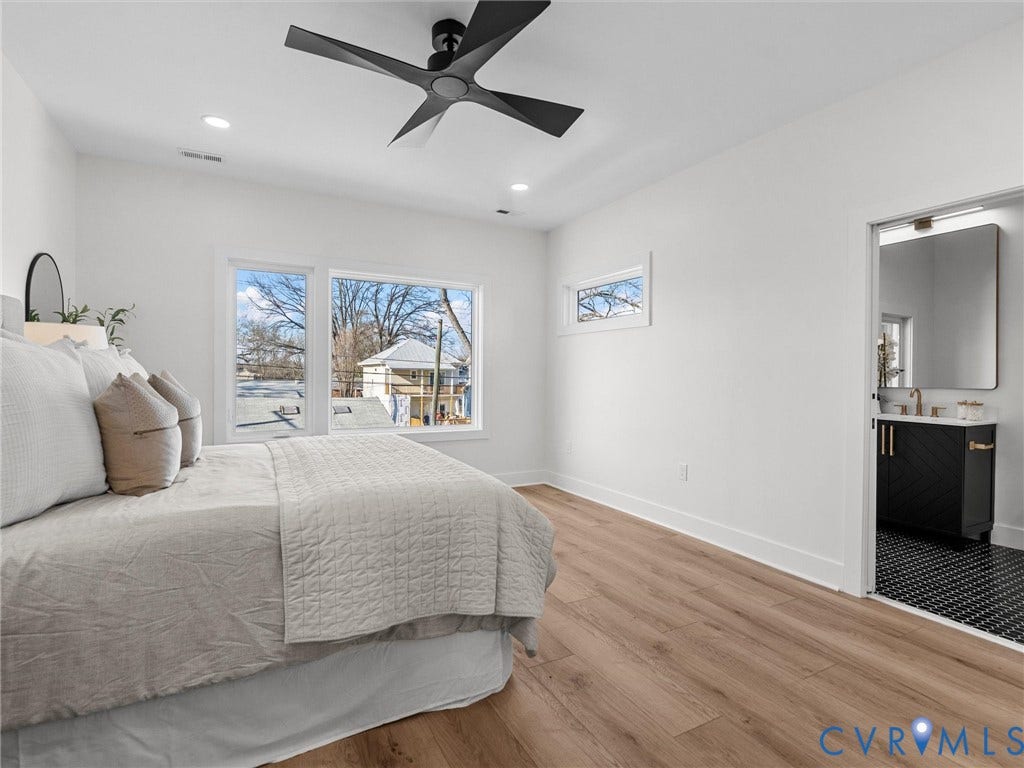 2202 3rd Avenue, Northside, Richmond, VA 23222 Spacious room featuring wood-finish flooring, recessed lighting, and a modern ceiling fan