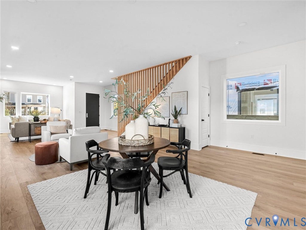 2202 3rd Avenue, Northside, Richmond, VA 23222 Open concept living area featuring light wood-finish flooring, recessed lighting, and a slatted wood room divider