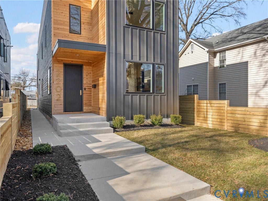 2202 3rd Avenue, Northside, Richmond, VA 23222 Modern facade featuring vertical wood paneling and dark metal siding