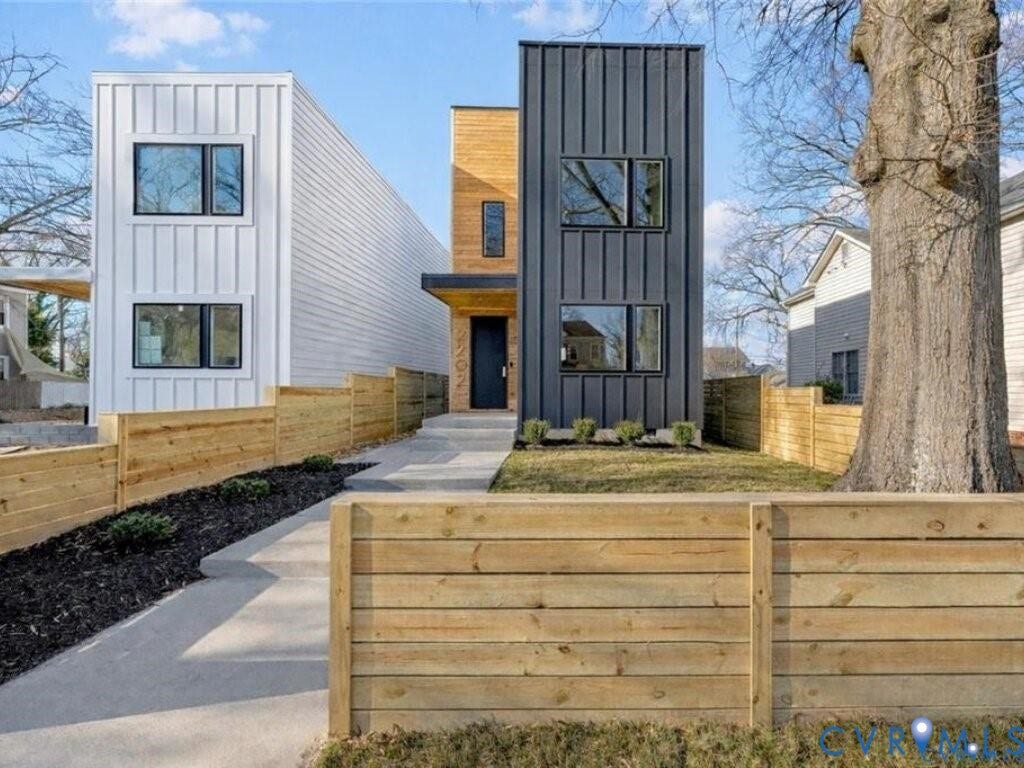 2202 3rd Avenue, Northside, Richmond, VA 23222 Contemporary exterior featuring vertical white siding and dark vertical paneling
