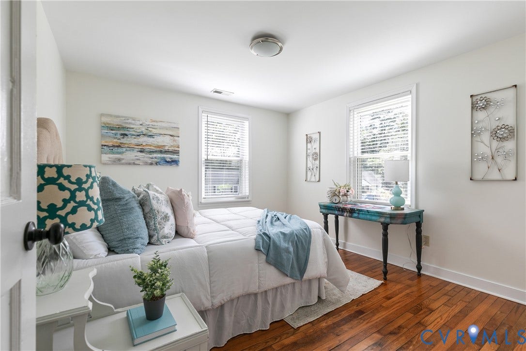 Bedroom #1, hardwood floors, light fixture, closet