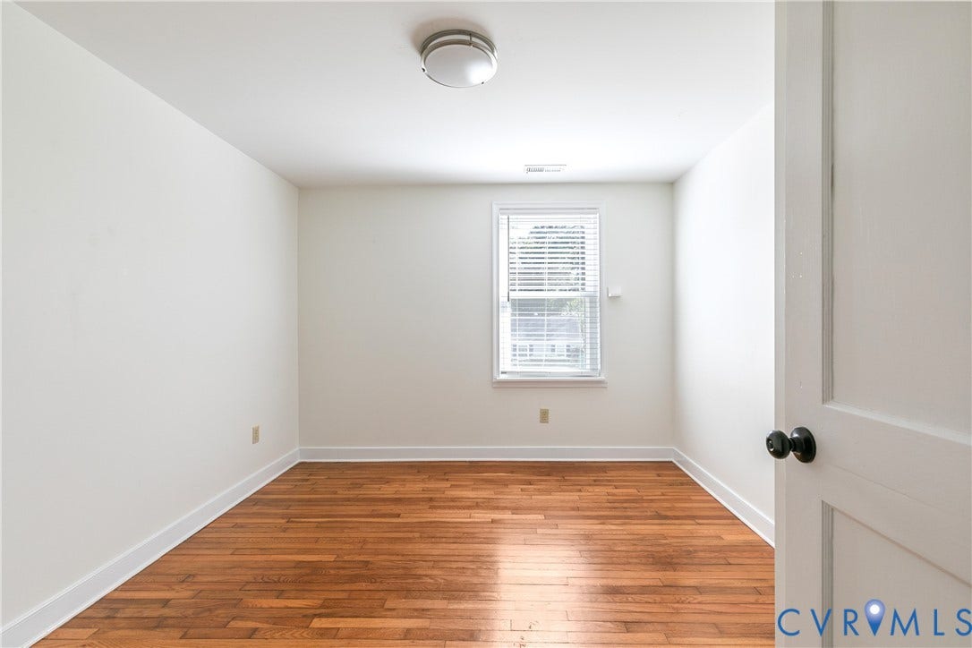 Bedroom #3, hardwood floors, light fixture, closet