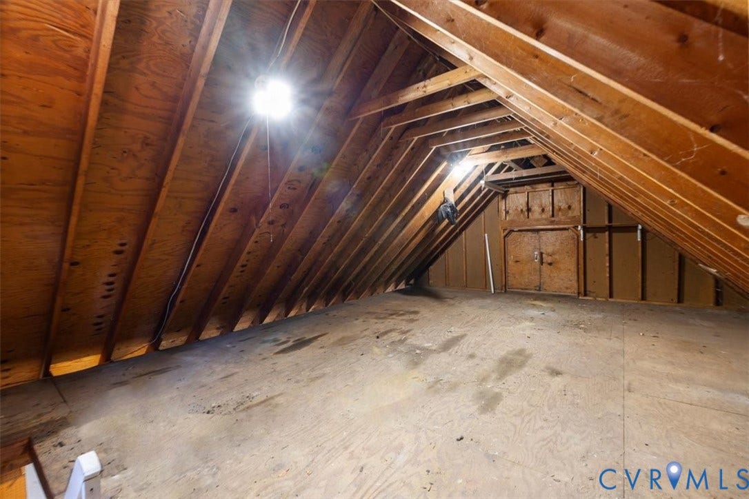Storge age area above garage accessed by stairway