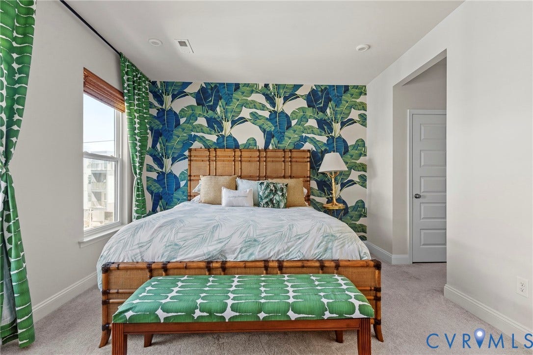 Recessed ceiling lighting, paneled interior door, window with wood blinds, and wall-to-wall carpeting