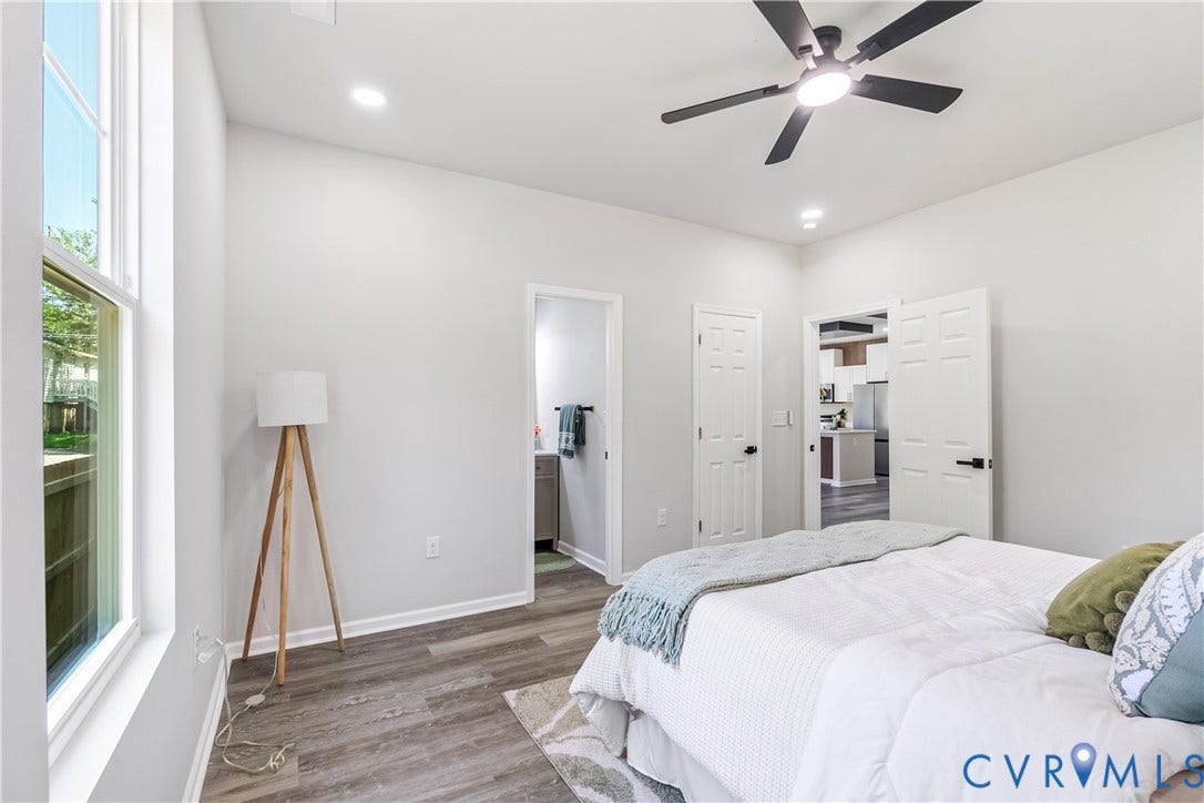 Wood-finish flooring, recessed lighting, and a ceiling fan