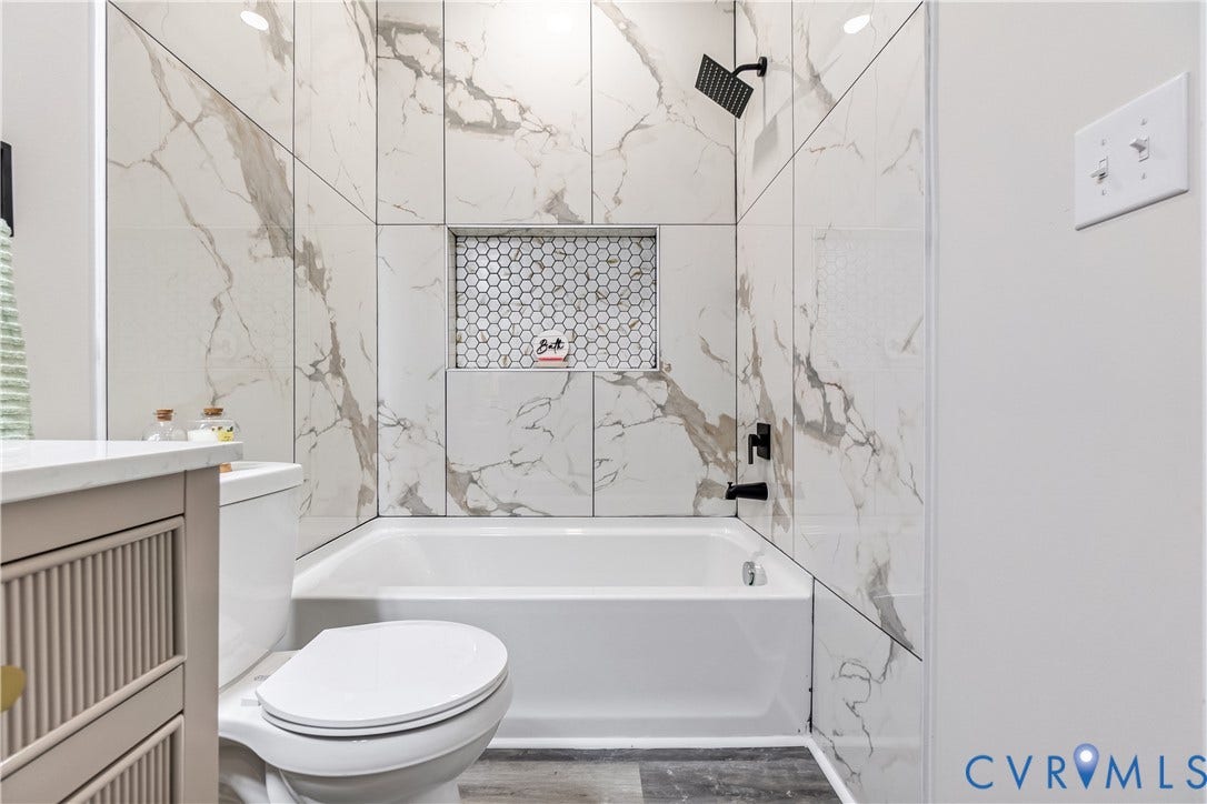 Contemporary wall tile with a marble-effect finish