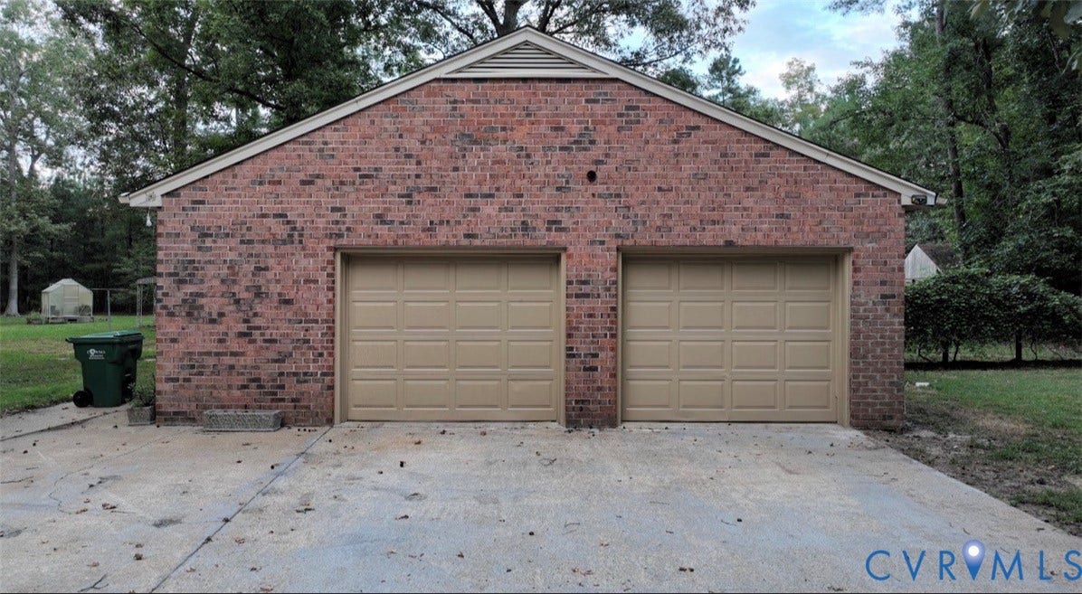 Brick exterior with a gabled roofline
