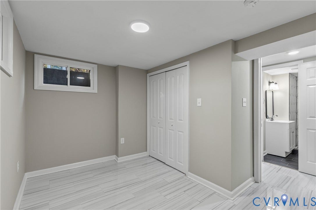2606 Hawthorne Avenue, Richmond, VA 23222 Recessed lighting, wood-finish flooring, bi-fold closet doors, and an egress window