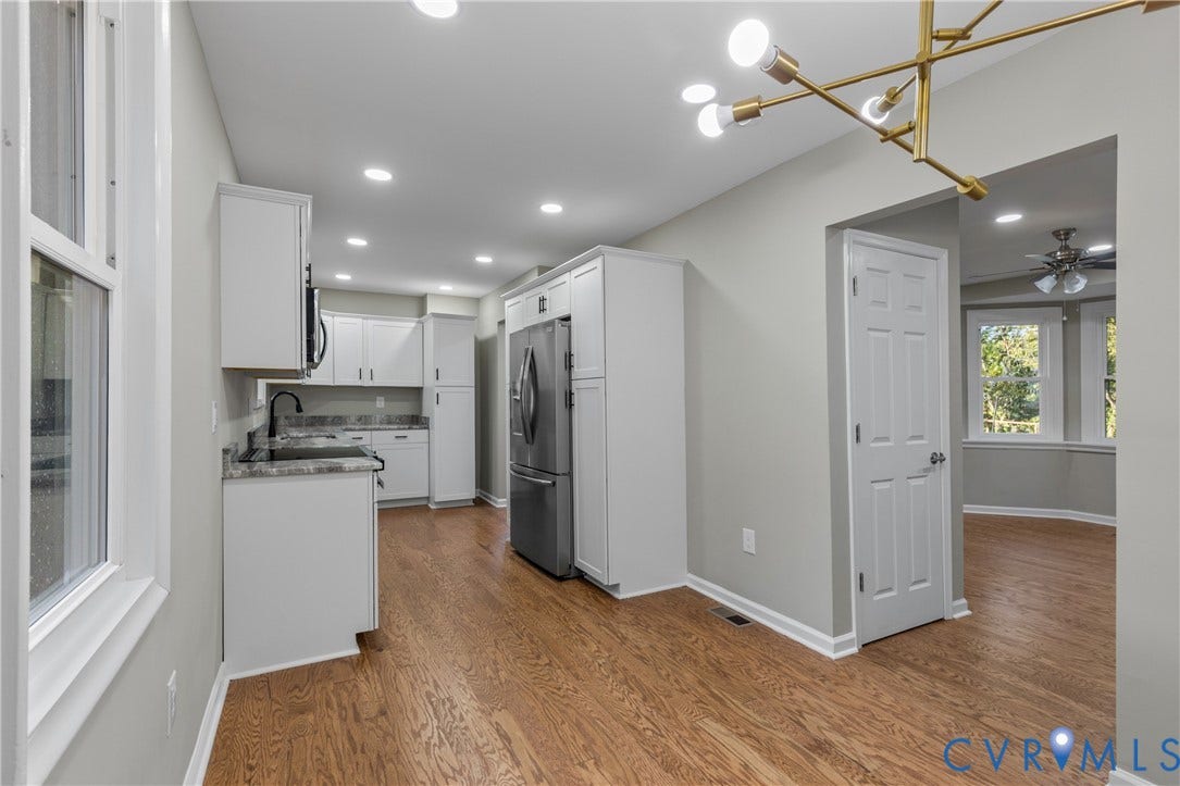 2606 Hawthorne Avenue, Richmond, VA 23222 Kitchen featuring white cabinetry, stone-finish countertops, stainless steel appliances, and wood-finish flooring