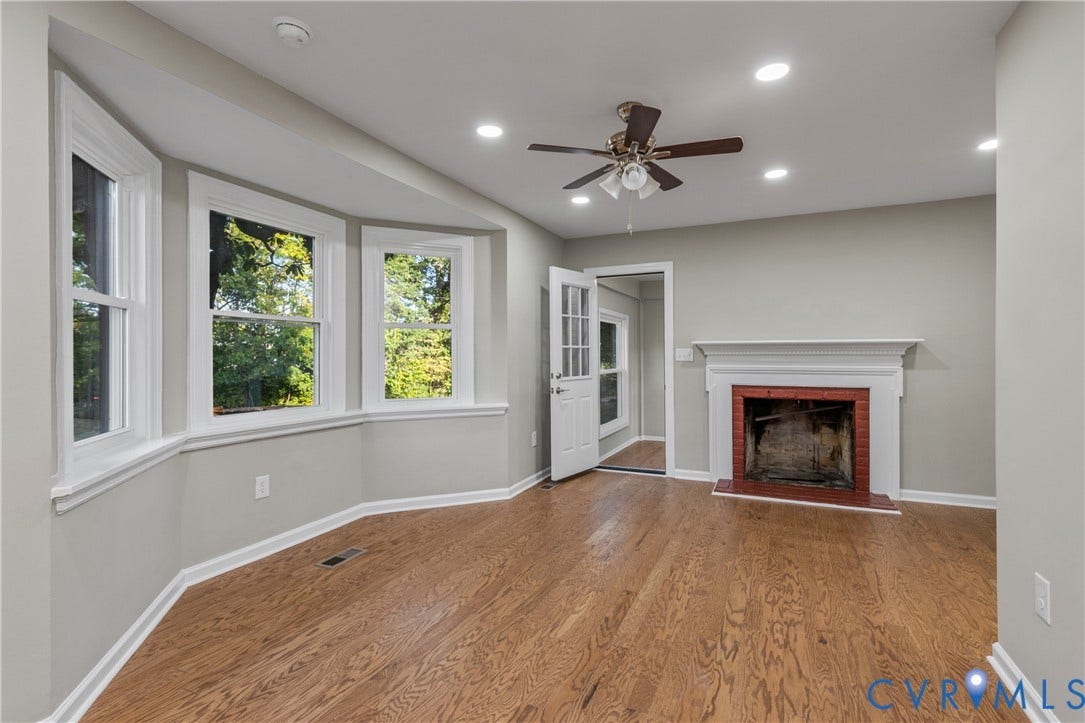 2606 Hawthorne Avenue, Richmond, VA 23222 Wood-finish flooring, recessed lighting, and a ceiling fan with light
