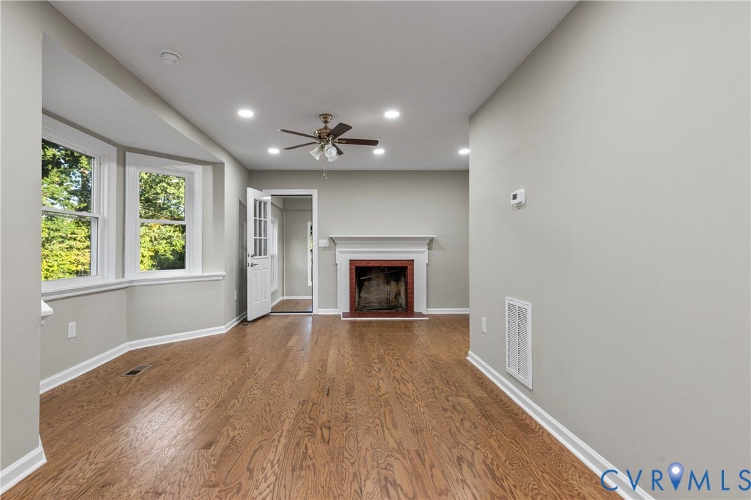 2606 Hawthorne Avenue, Richmond, VA 23222 Hardwood-finish flooring, recessed lighting, ceiling fan, fireplace with mantel, and bay windows