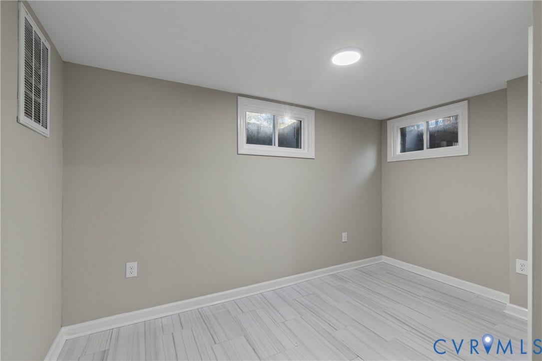 2606 Hawthorne Avenue, Richmond, VA 23222 Freshly painted walls, recessed lighting, and wood-finish flooring