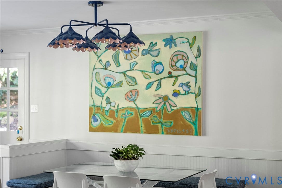 Built-in banquette seating with wainscoting and crown molding