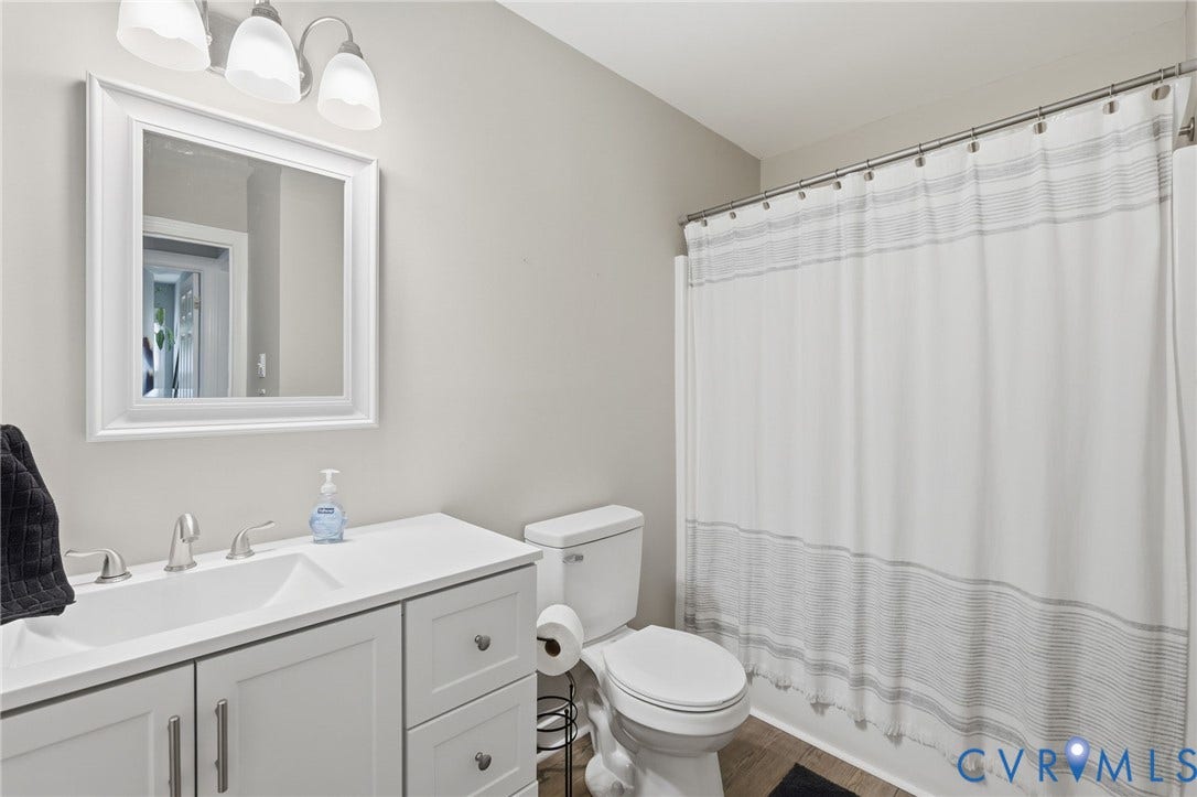 5054 Oakforest Drive, Chesterfield, VA 23832 Renovated full bathroom (2024) with shower/tub combo