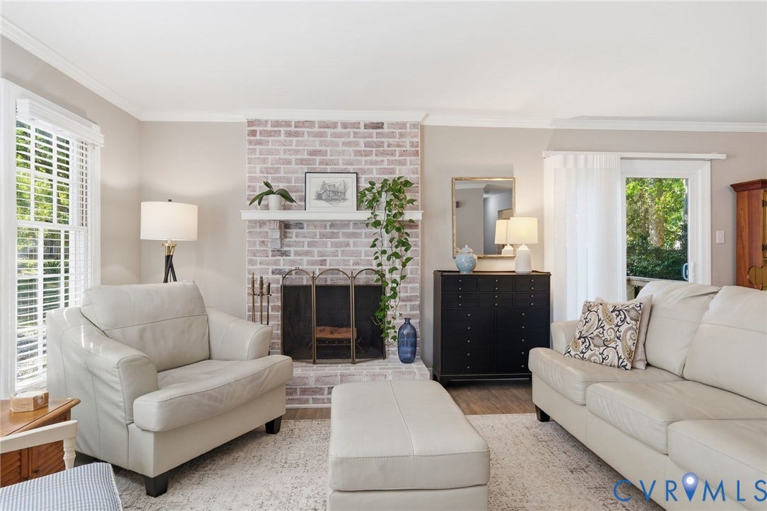 5054 Oakforest Drive, Chesterfield, VA 23832 Comfortable living room designed for cozy evenings by the wood-burning fireplace