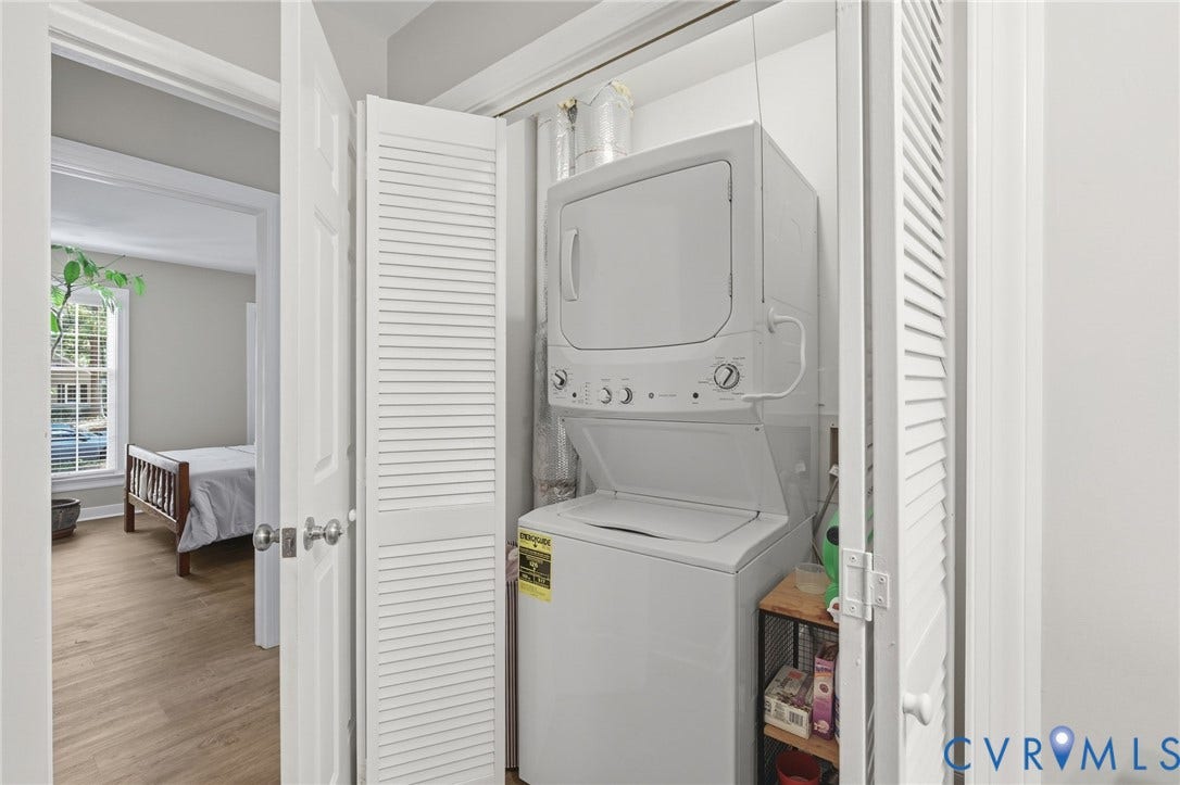 5054 Oakforest Drive, Chesterfield, VA 23832 Main-level laundry area with stacked washer/dryer (2024)