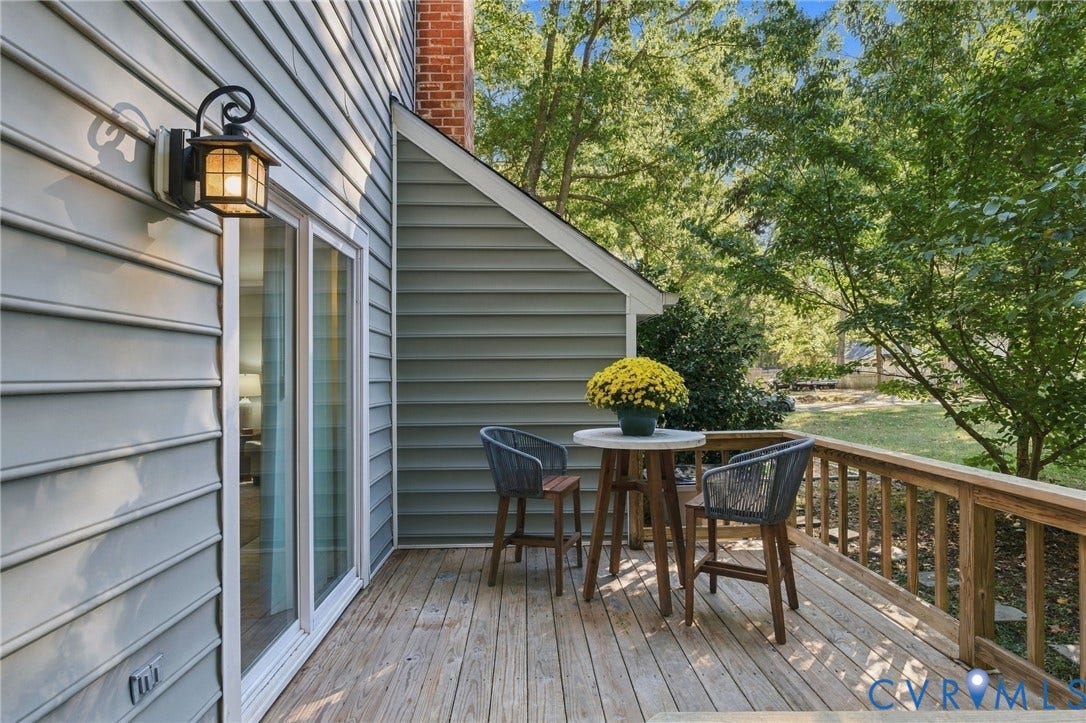 5054 Oakforest Drive, Chesterfield, VA 23832 Extend your living space outdoors with a wooden deck overlooking the yard
