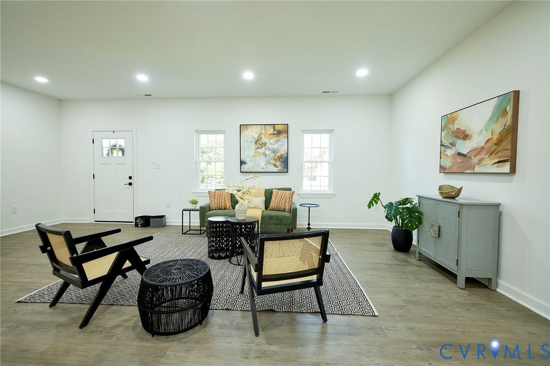 2421 Buena Vista Boulevard, Chester, VA 23831 Spacious room with wood-finish flooring, recessed lighting, and white walls