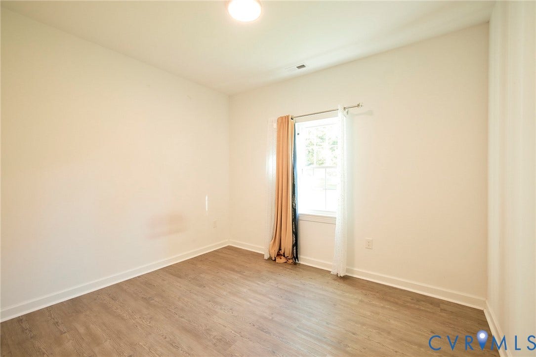 2421 Buena Vista Boulevard, Chester, VA 23831 Light-filled room featuring wood-finish flooring and a single window
