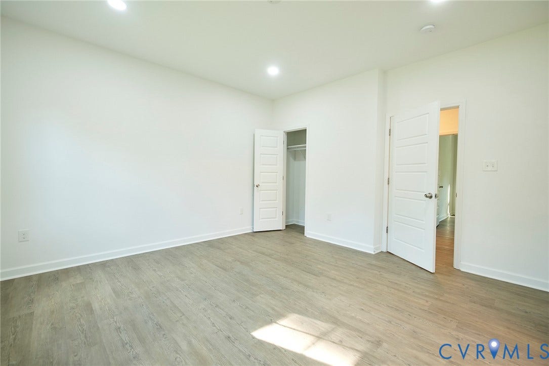 2421 Buena Vista Boulevard, Chester, VA 23831 Recessed lighting, light wood-finish flooring, white walls, and a closet with a bi-fold door