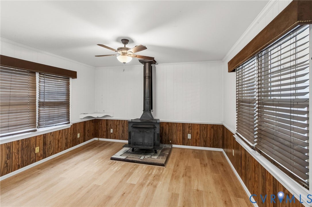 7847 Beaver Drive, All Others Area 20, Gloucester, VA 23061 Wood-finish flooring with wainscoting and white wall paneling