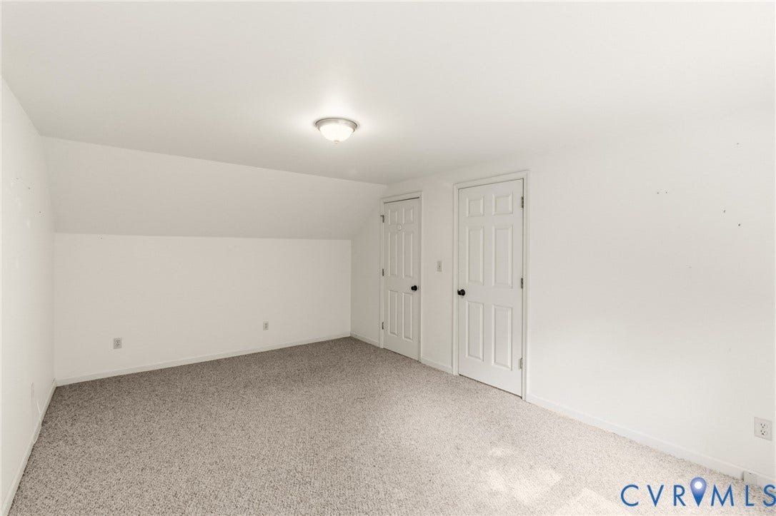 7847 Beaver Drive, All Others Area 20, Gloucester, VA 23061 Sloped ceiling, two paneled doors, surface-mount ceiling light, and neutral carpeting