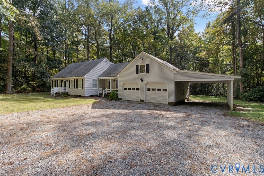 7847 Beaver Drive, All Others Area 20, Gloucester, VA 23061 Ranch-style exterior with a covered front porch, two-car garage, and an attached carport