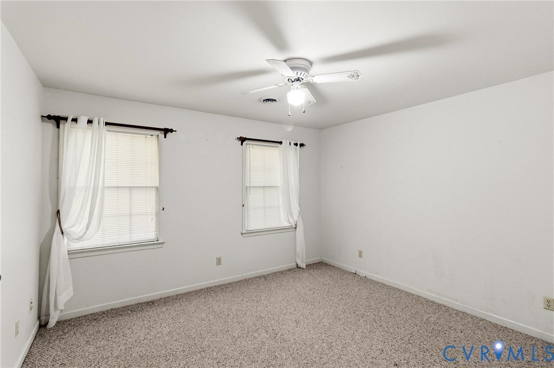 7847 Beaver Drive, All Others Area 20, Gloucester, VA 23061 White walls with carpeted flooring, two windows with blinds, and a ceiling fan