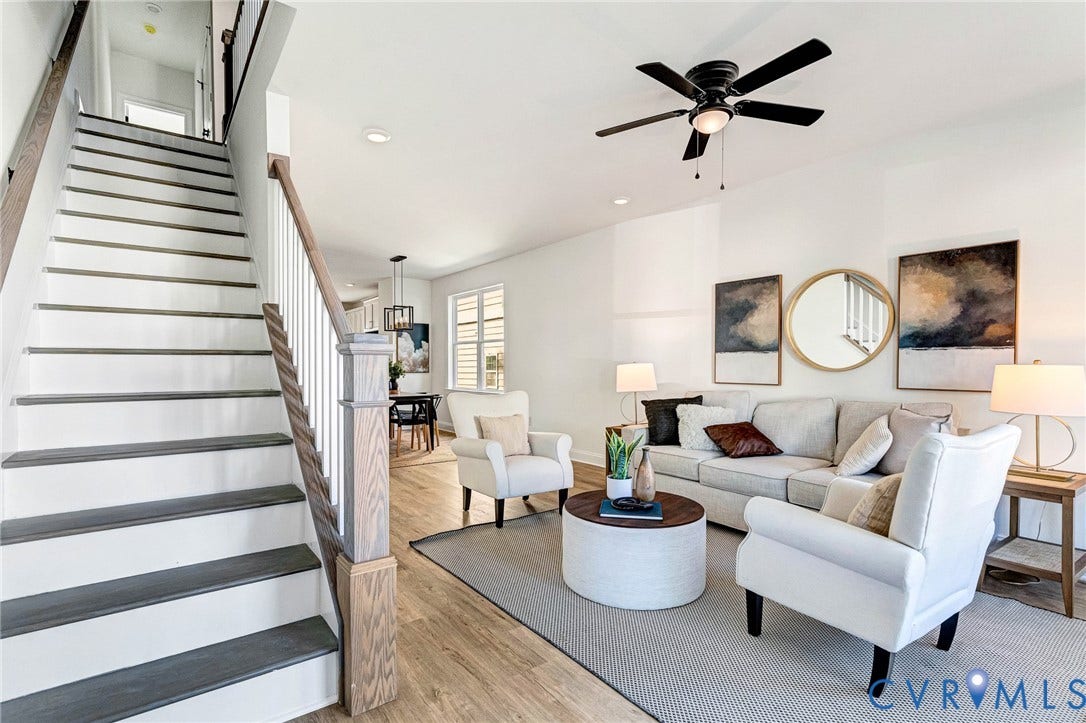 Light wood-finish flooring throughout the living space