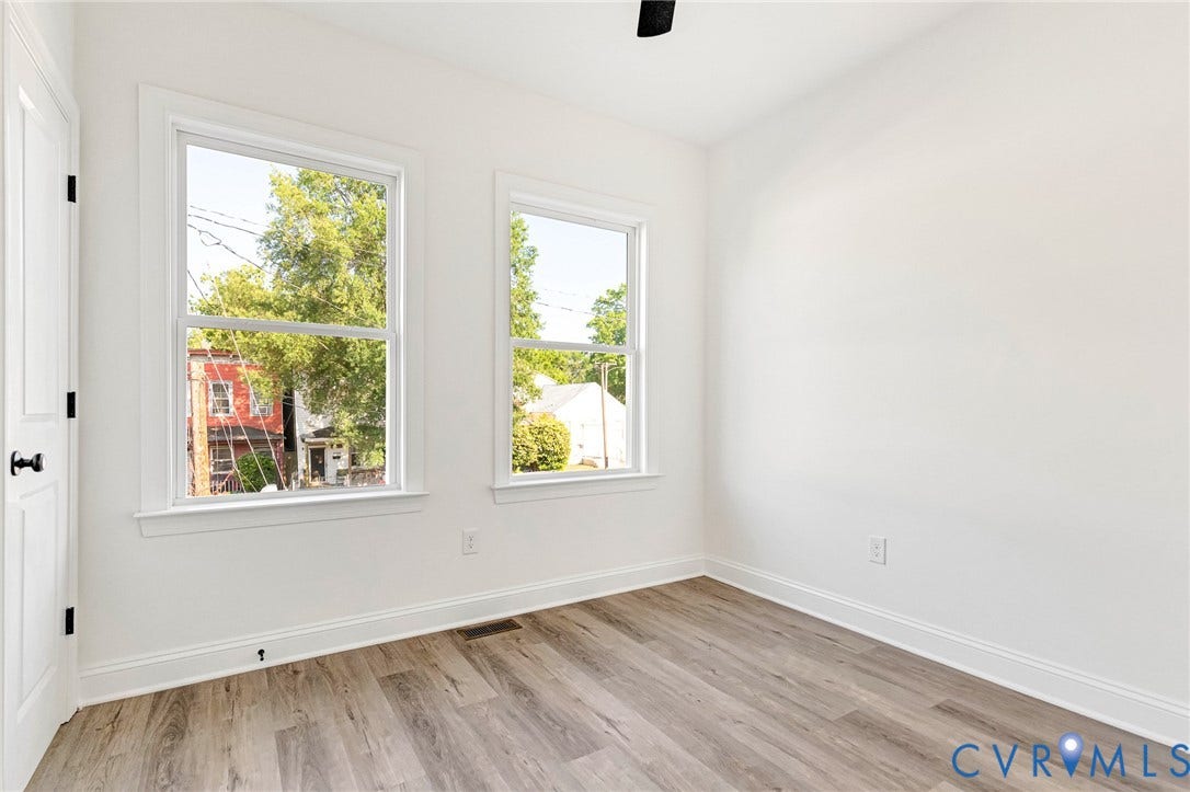 Neutral paint finishes complement wood-finish flooring