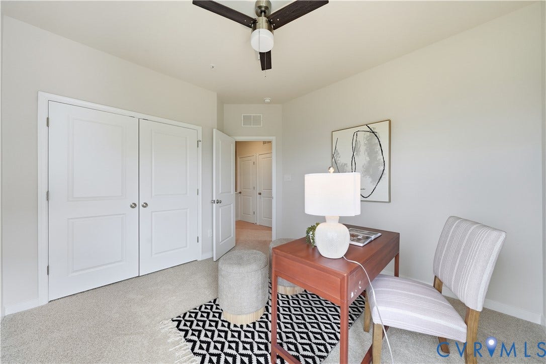 Secondary bedroom with new carpet.