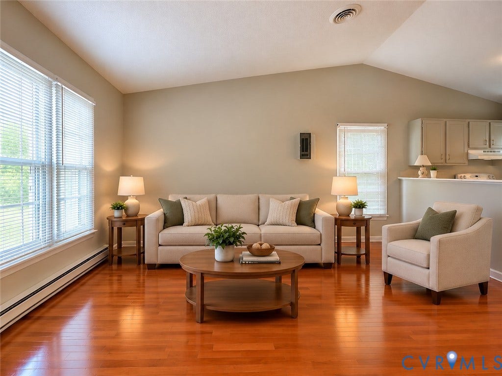 Henrico, VA 23223 Vaulted ceilings, wood-finish flooring, and natural light from multiple windows