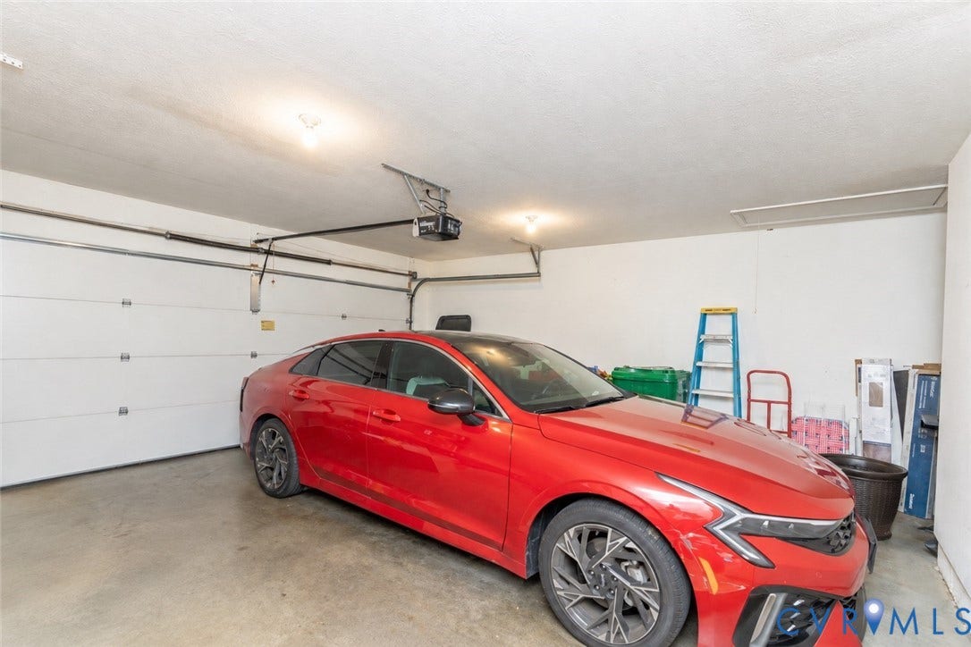 Attached garage automatic opener, and concrete flooring