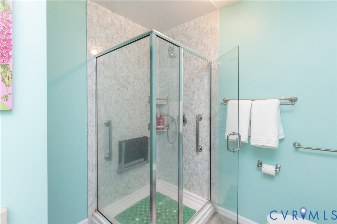 Glass-enclosed shower