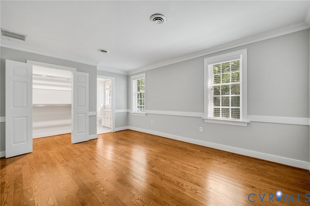 10303 Silverbrook Drive, Henrico, VA 23233 Hardwood flooring, crown molding, double-hung windows, built-in closet shelving, and a bright interior