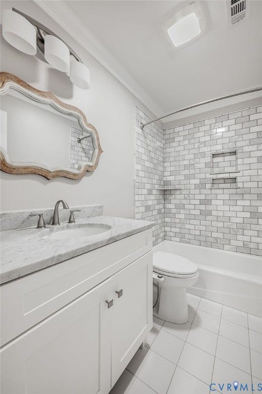 10303 Silverbrook Drive, Henrico, VA 23233 White shaker vanity with a stone countertop and undermount sink