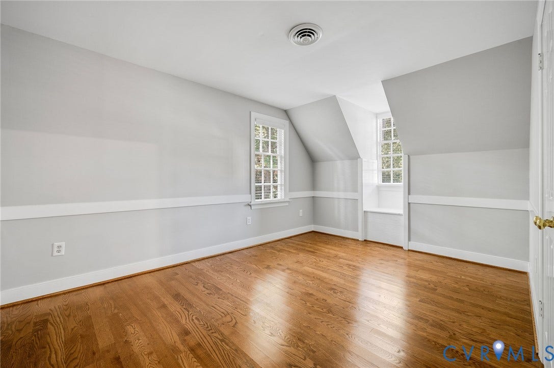 10303 Silverbrook Drive, Henrico, VA 23233 Hardwood flooring, painted walls with chair rail, dormer windows, and a built-in window seat