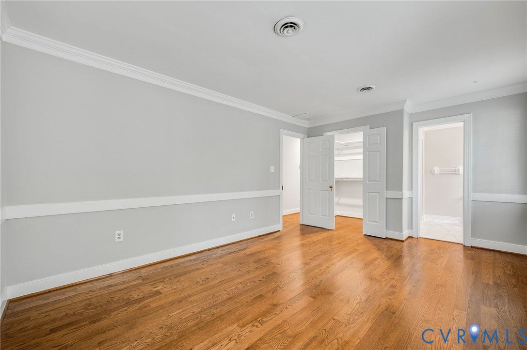 10303 Silverbrook Drive, Henrico, VA 23233 Hardwood flooring, crown molding, chair rail molding, bi-fold closet doors, and interior paneled doors