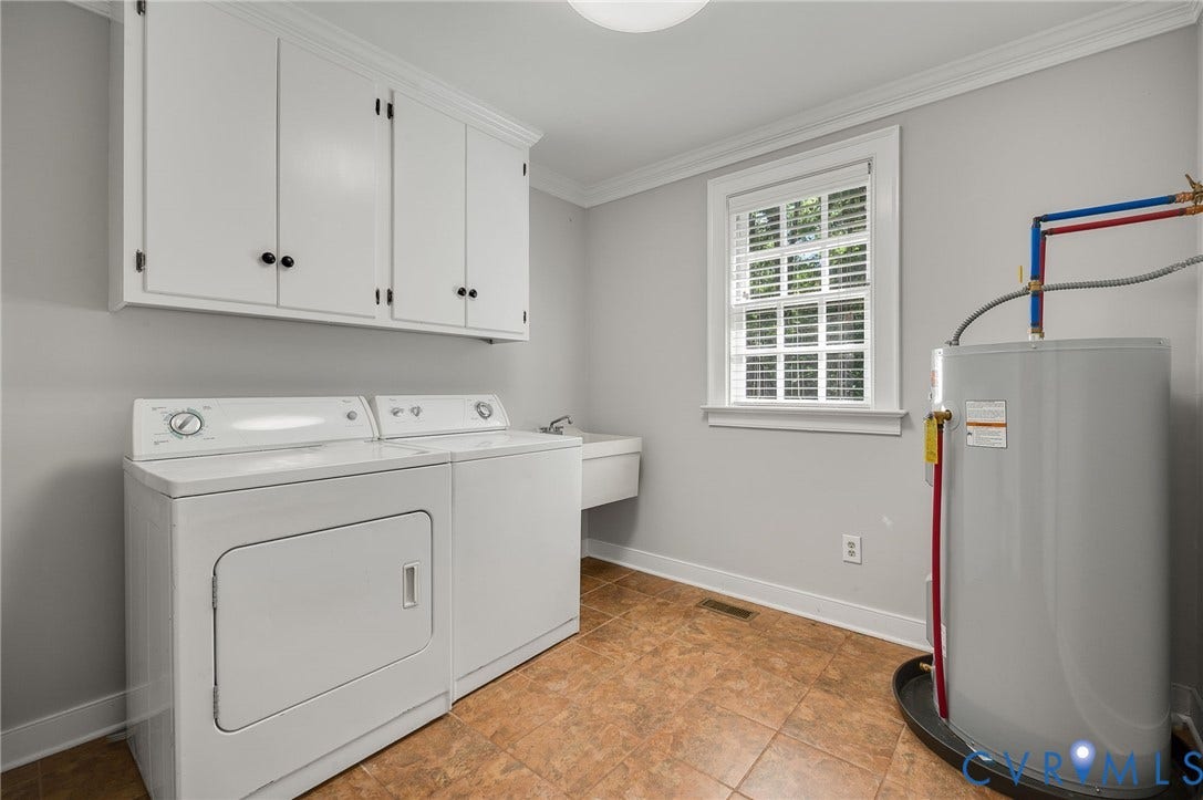 10303 Silverbrook Drive, Henrico, VA 23233 White upper cabinetry, utility sink, window with blinds, and durable tile flooring