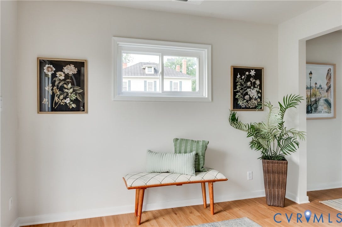8010 Callison Drive, Glen Allen, VA 23060 Wood-finish flooring with crisp white baseboards and light-toned walls
