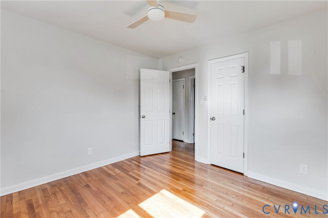 8010 Callison Drive, Glen Allen, VA 23060 Hardwood flooring, painted interior walls, ceiling fan, and white paneled doors