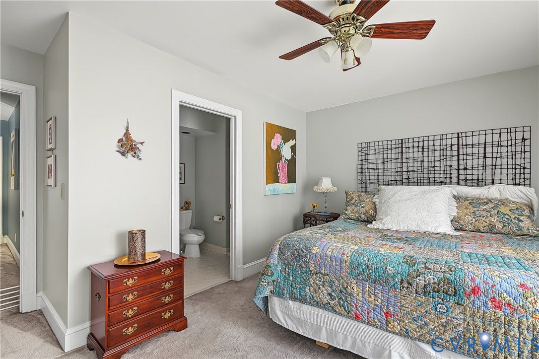 3131 Stony Point Road, #B, Richmond, VA 23235 Soft gray wall paint, recessed lighting, carpet flooring, ceiling fan with wood-finish blades, and an en-suite bathroom with a toilet