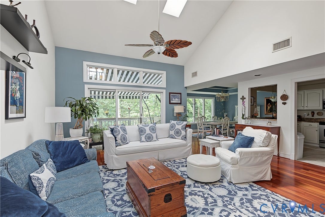 3131 Stony Point Road, #B, Richmond, VA 23235 Vaulted ceiling with skylight, wood-finish flooring, recessed lighting, and a large glass sliding door